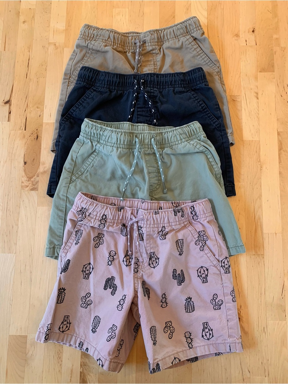 4 pairs of shorts - Cat and Jack - khaki, navy, olive green, cactus print - 4T